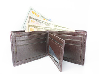 100, 50 , 10 US. dollar banknote in the dark brown wallet on white background