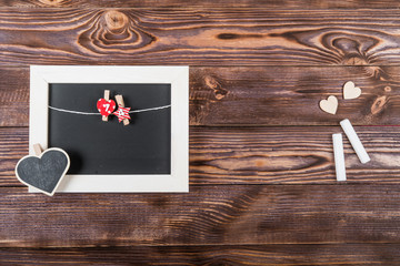 Hearts, love, Valentine's Day on a dark wooden rustic background