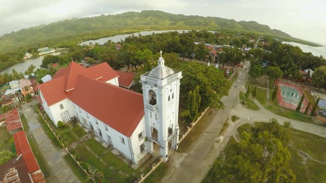 Aerial view Catholic Church in the Philippines. Anda. Poblacion city.