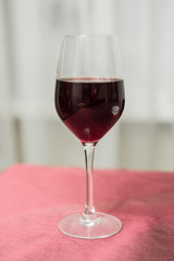 Glass of red wine in the interior