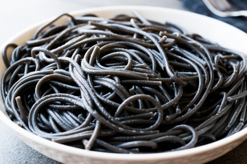 Black Spaghetti Pasta Flavored with Squid ink Cuttlefish or Inkfish.