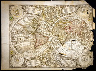 Very old world map torn, of old style of the 18th century, with on the map California in the form...