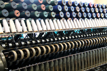 The Reels and Spools of a Vintage Textile Machine.