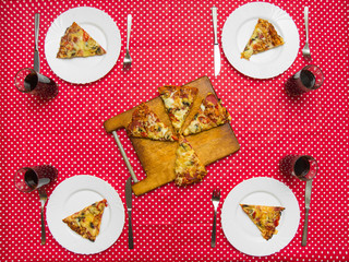 served pizza on the table