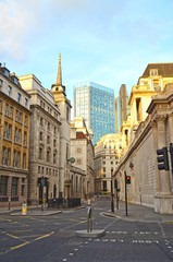View of Lothbury Street in London Banking District, overlooking a skyscraper and St. Margaret's...
