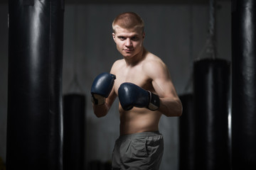 Young boxer in readiness