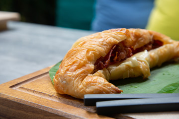 Croissant with bacon cheese