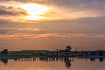 A Cloudy Sunset with Beautiful Reflections
