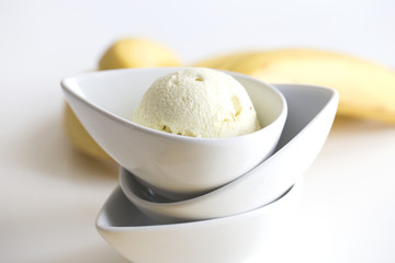 delicious ice cream  and bananas on a white background