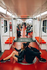 The love story of a guy and a girl in the subway. Young people travel.
