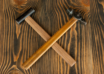 hammers on wooden background and with the view from above