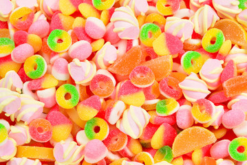 Fototapeta na wymiar Assorted gummy candies. Top view.