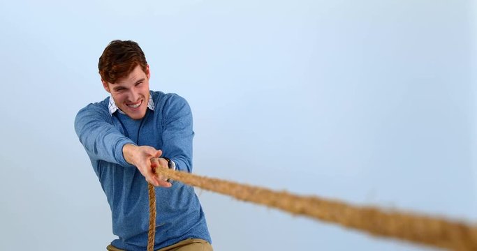 Man pulling a rope against white background 4k