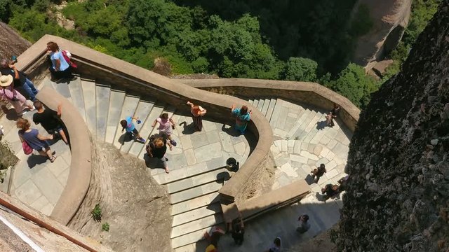 11.06.2018 Greece, Thessaly, motion of people on a stairs of Meteora. time lapse