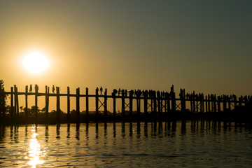 U Bein Bridge, Amarapura, Myanmar - view of this famous bridge during the sunset at Taung Tha Man Lake