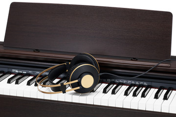 headphones on the piano keyboard
