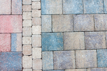 Three different brick paviers on a patio.