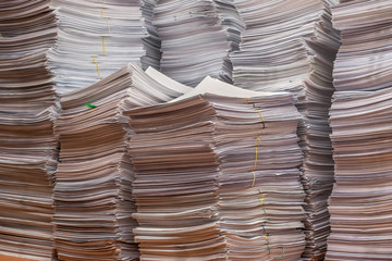 pile of paper documents in the office
