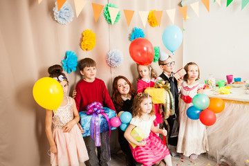 Obraz na płótnie Canvas beautiful kids are happy on the birthday party