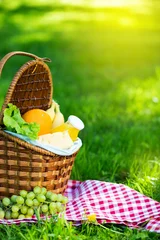 Fotobehang Picnic basket with vegetarian food in summer park © photopixel