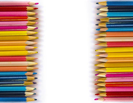 colored pencils on a white background 