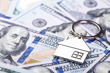 Metal Key chain on dollar banknotes background