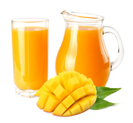 mango juice with mango slice isolated on white background. jug of mango juice.