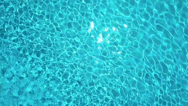 Topview from a drone over the surface of the pool