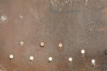 Abstract corroded rusty metal background, texture, brown.