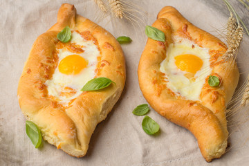 Khachapuri traditional Georgian cheese and egg-filled bread