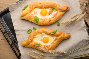 Khachapuri traditional Georgian cheese and egg-filled bread