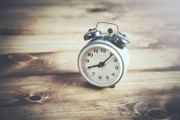 vintage watch on wooden table background