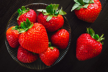 Fresh Strawberries Arranged on Wood Table