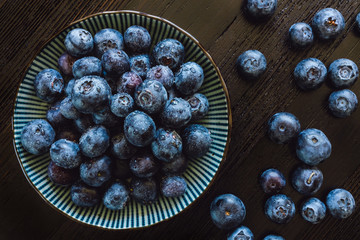 Fresh Blueberries Arranged on Wood Table