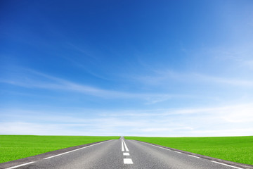 Way, field, and sky . Transportation concept