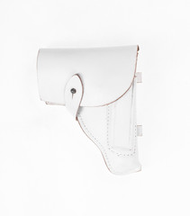 white holster with a gun