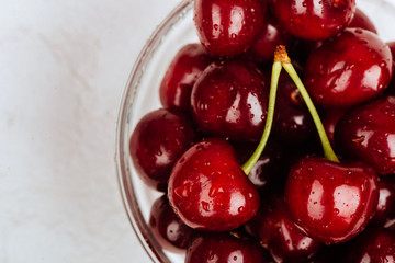 Cherries in glassr bowl.