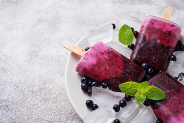 Sweet homemade popsicles with blueberry