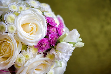 Beautiful wedding bouquet of white, pink and ultra violet flowers place for text.