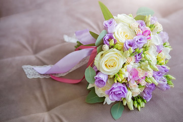 Beautiful wedding bouquet of white, pink and ultra violet flowers place for text.