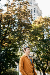 on the streets of Warsaw. The guy in the city center. Travel the European city. Stylishly dressed man with a briefcase in a hurry to work and study. The man travels to the cities of .Europe. Poland