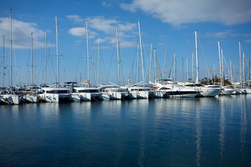 Fototapeta na wymiar Yachts parking in harbor