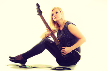 Fototapeta premium Woman with electrical guitar and vinyl record.
