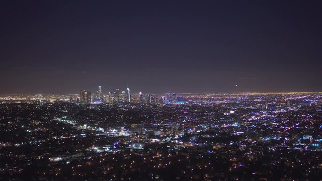 4K Blurred to Focused View of City Skyline at Night