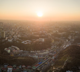 A bird's eye view, aerial view shooting from drone of the Podol district, oldest historical center of Kiev, Ukraine.