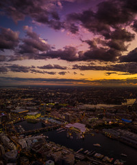 Tall buildings in the city and in the evening from above