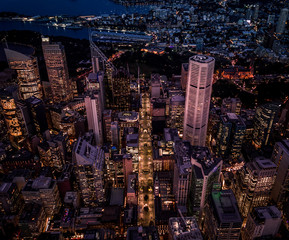 Tall buildings in the city and in the evening from above