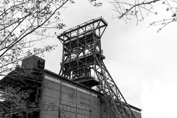 historic mining tower in black and white