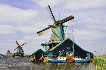 Fototapeta premium Valley of the picturesque wooden windmills in Zaanse Schans, the Netherlands.