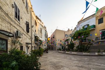 Fototapeta na wymiar A colorful square in the Jewish quarter of Trani, Apulia, Italy. Trani in 12th century housed one of the largest Jewish communities of Southern Italy